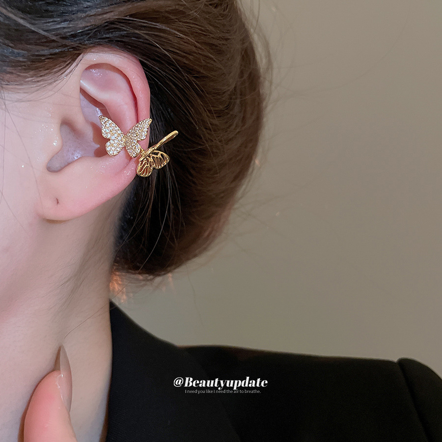 Clip de oreja de mariposa hueca de circón Clip de hueso de oreja sin orificio de oreja Pendientes de diseño de moda simple de alta calidad Pendientes de lujo ligero para mujer