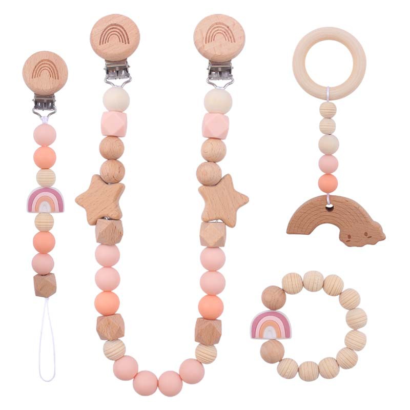Nuevo bebé suministros dibujos animados silicona Arco Iris mordedor calmante bebé chupete cadena coche colgando mordedor conjunto de cuatro piezas