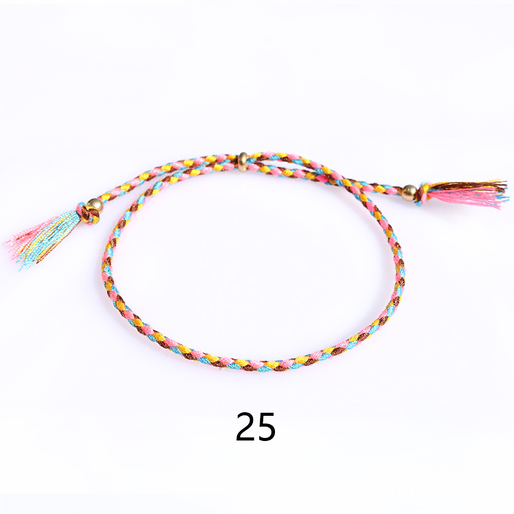 Amazon popular colorido cuerda de algodón amistad pulsera perlas de cobre borla pulsera tejida a mano ajustable hombres y mujeres pulsera