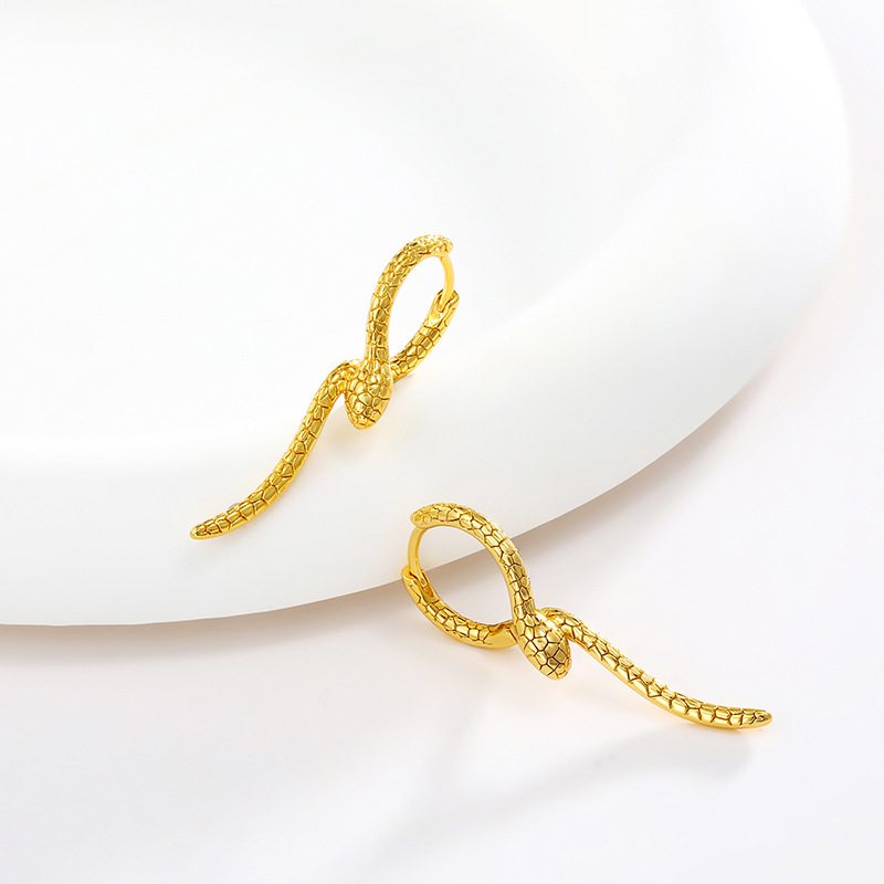 Joyas Xuping retro personalidad europea y americana serpiente cruzada alrededor de pendientes de serpiente ágiles temperamento frío pendientes de moda