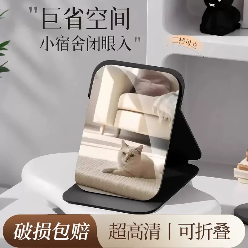 Folding handheld table mirror