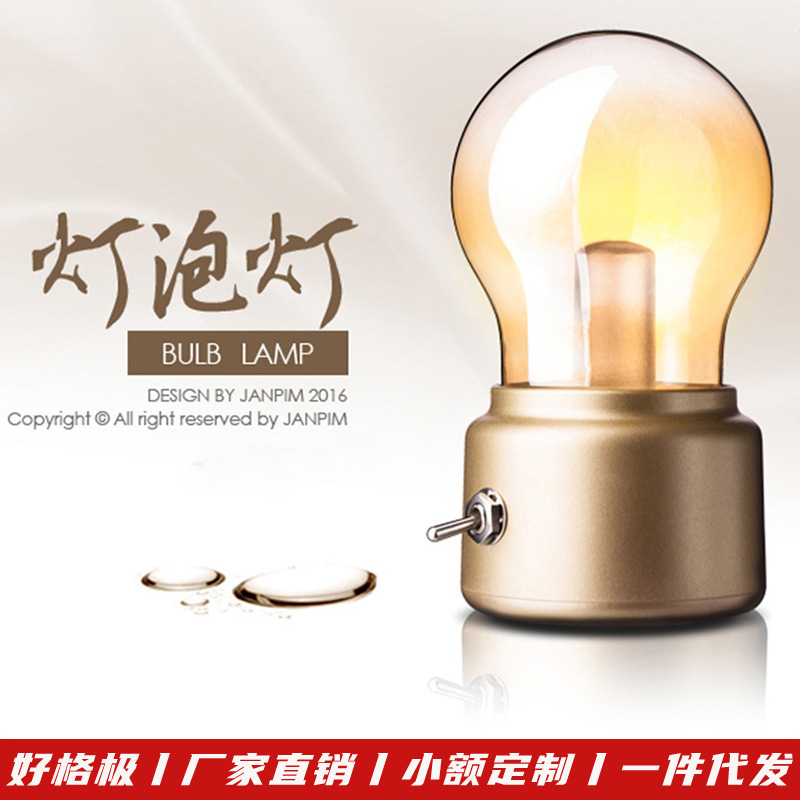 Lámpara nocturna en forma de bombilla, recargable por USB.