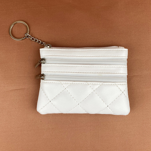 Small clutch bag with diamond pattern