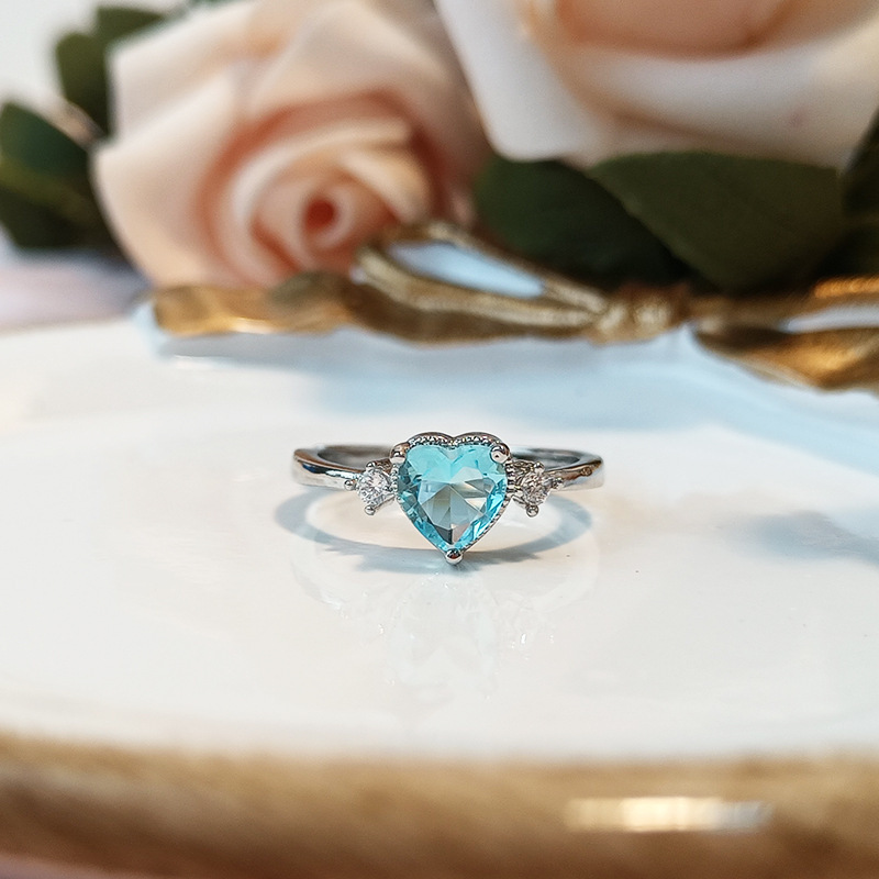 Cross-border hot sale imitation navy blue topaz ring love heart-shaped female aquamarine diamond ring couple proposal ring wholesale