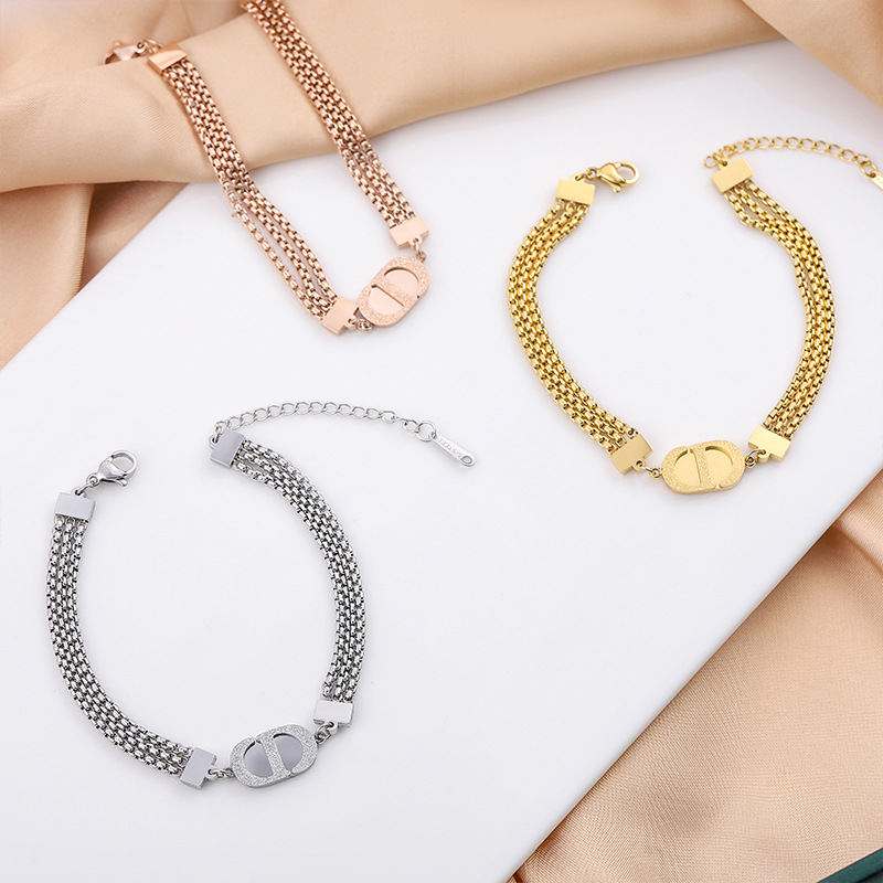 Europa y los Estados Unidos transfronterizos Amazon nuevas letras CD chapado en oro 18K esmerilado tres pulseras de acero de titanio lujoso para mujeres image 2