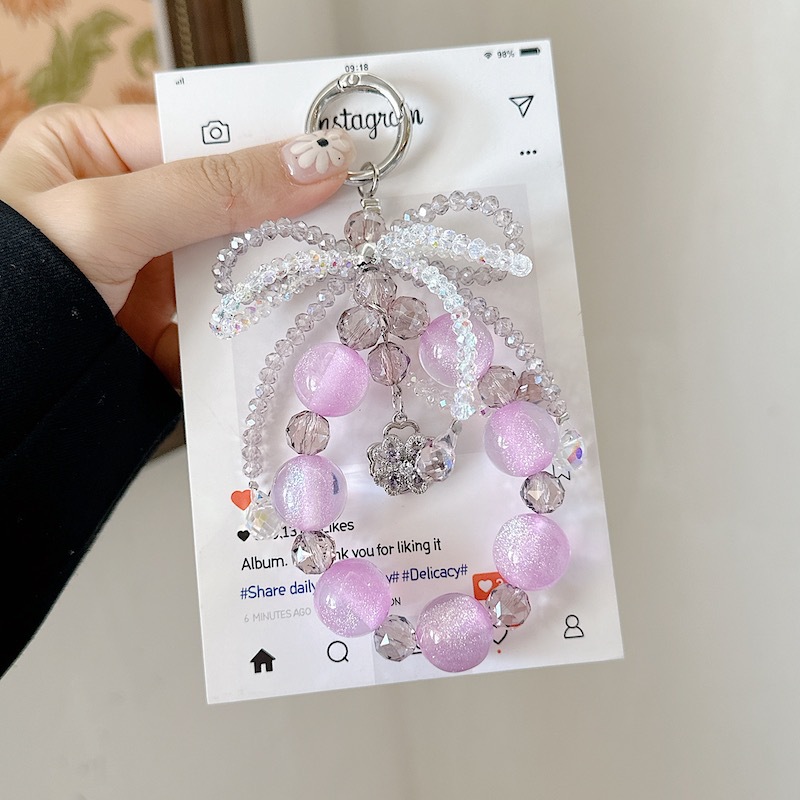 Boutique hecho a mano de alta gama para teléfono móvil cadena femenina ins linda cadena de cuentas de vidrio cordón de teléfono móvil de moda colgante de mensajero largo