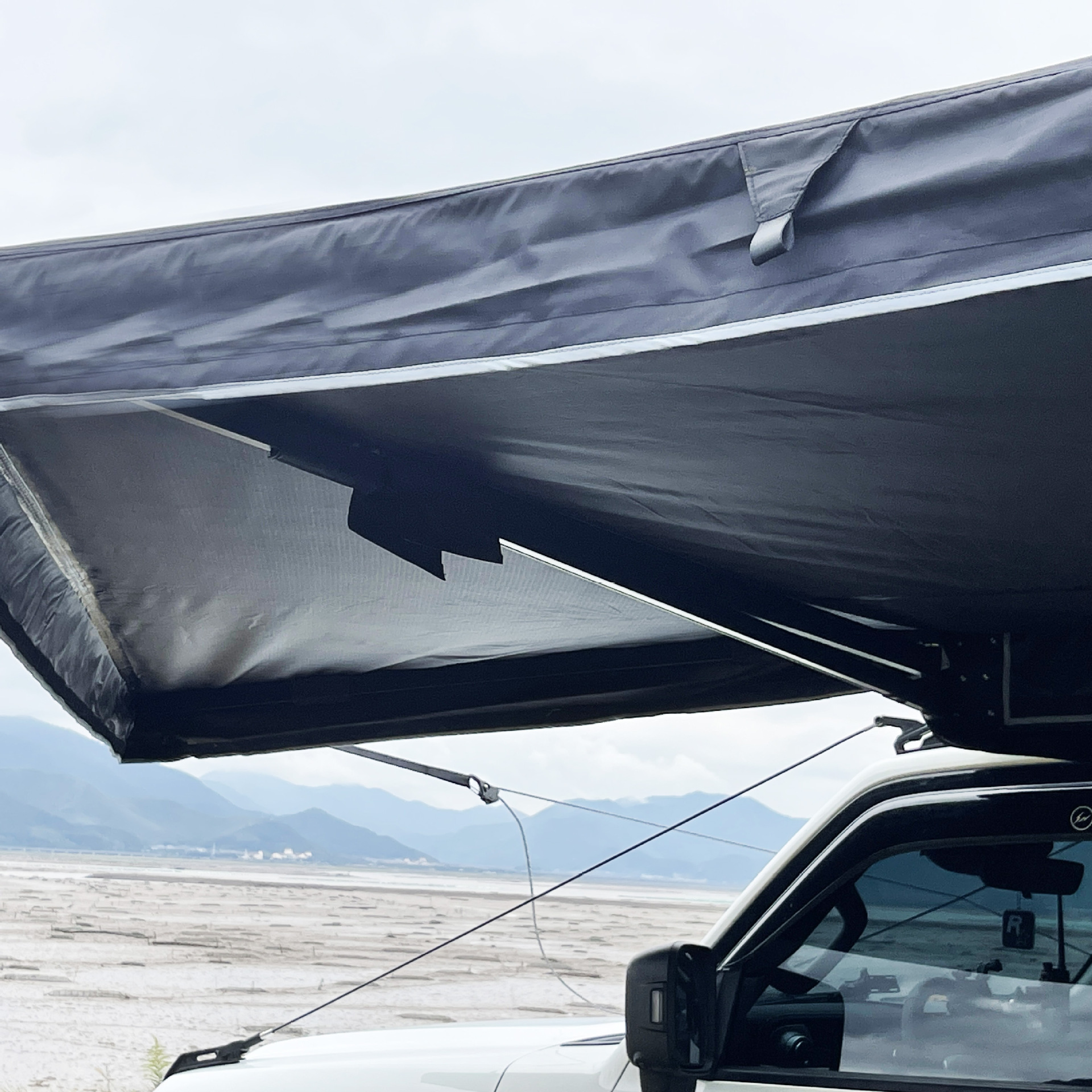 Versión expandida de 360 grados sin hueso en forma de ventilador carpa de techo con lámpara para automóviles sombrilla de lluvia plegable para viajes autónomos