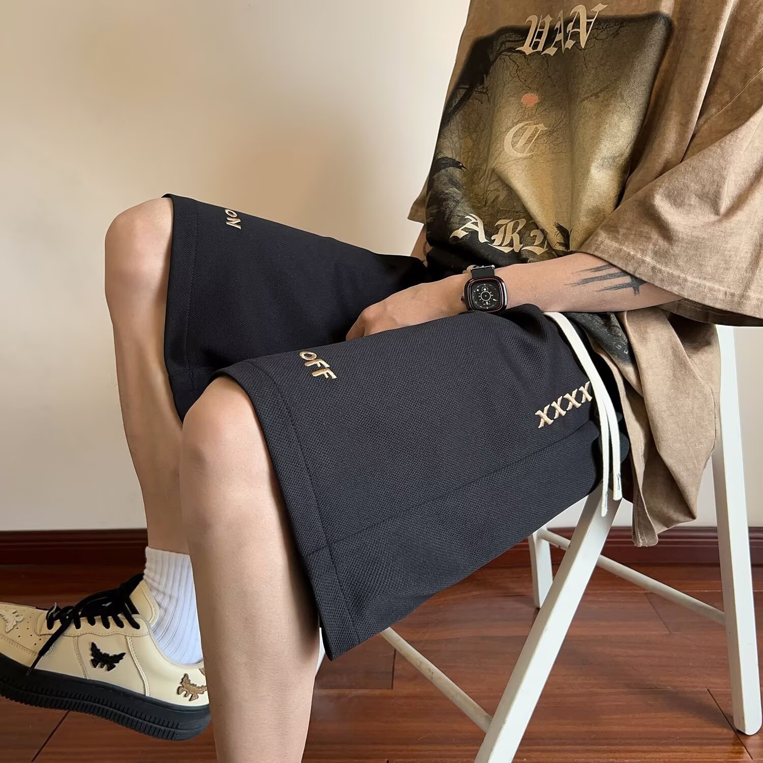 Pantalones cortos estadounidenses para hombres de verano delgados 2025 nuevos pantalones de moda sueltos pantalones deportivos de estilo de tendencia portugués