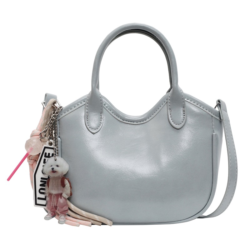 Bolso de tendencia extranjera, bolso de mano de mujer 2025, nuevo estilo de moda, bolso de cubo de hombro casual, mochila de textura de alta calidad