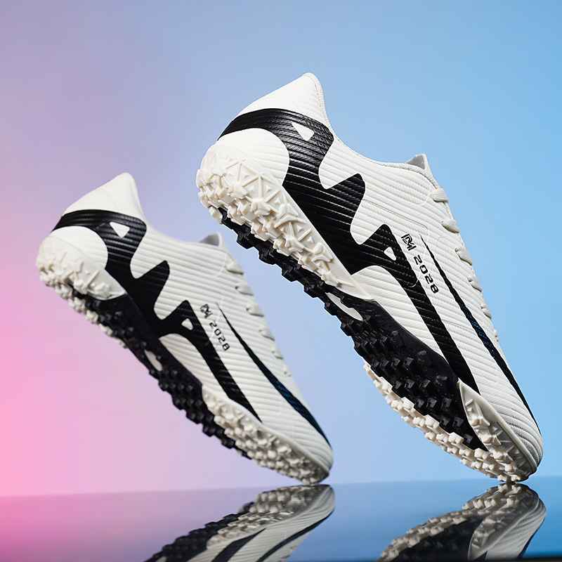 Nuevas zapatillas de fútbol transfronterizas, jóvenes estudiantes masculinos y femeninos, uñas rotas, uñas largas para adultos, zapatos de entrenamiento de competencia deportiva de hierba