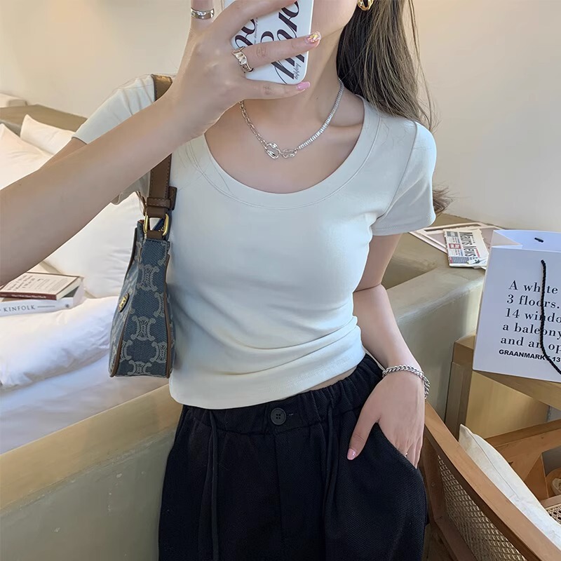 純欲u襟鎖骨tシャツの女性の肩の半袖の夏のタイトなギャルの純綿の臍の短い上着を代行します。|undefined