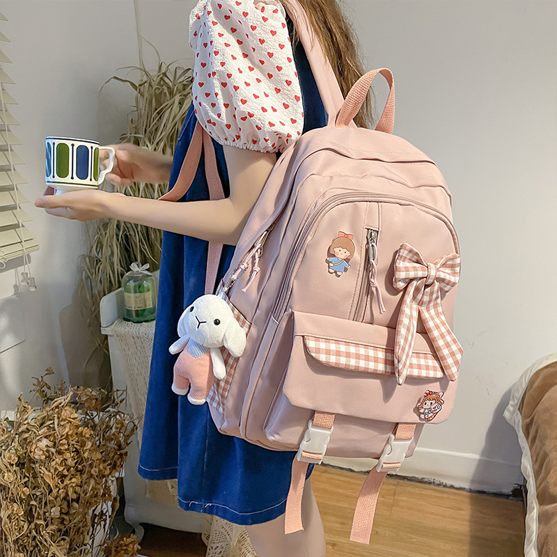 Mochila escolar para niñas de primaria y secundaria, diseño con lazo y estilo dulce, ligera y espaciosa