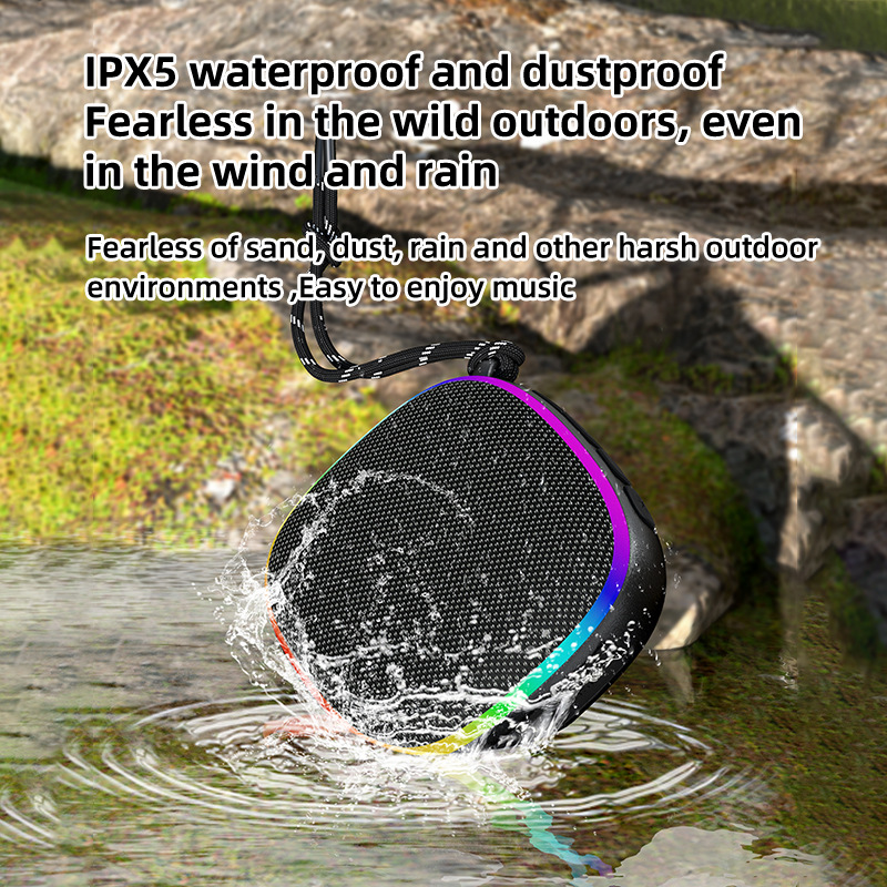 Al aire libre nuevo altavoz Bluetooth de absorción de tela subwoofer al aire libre impermeable portátil mini sonido al por mayor