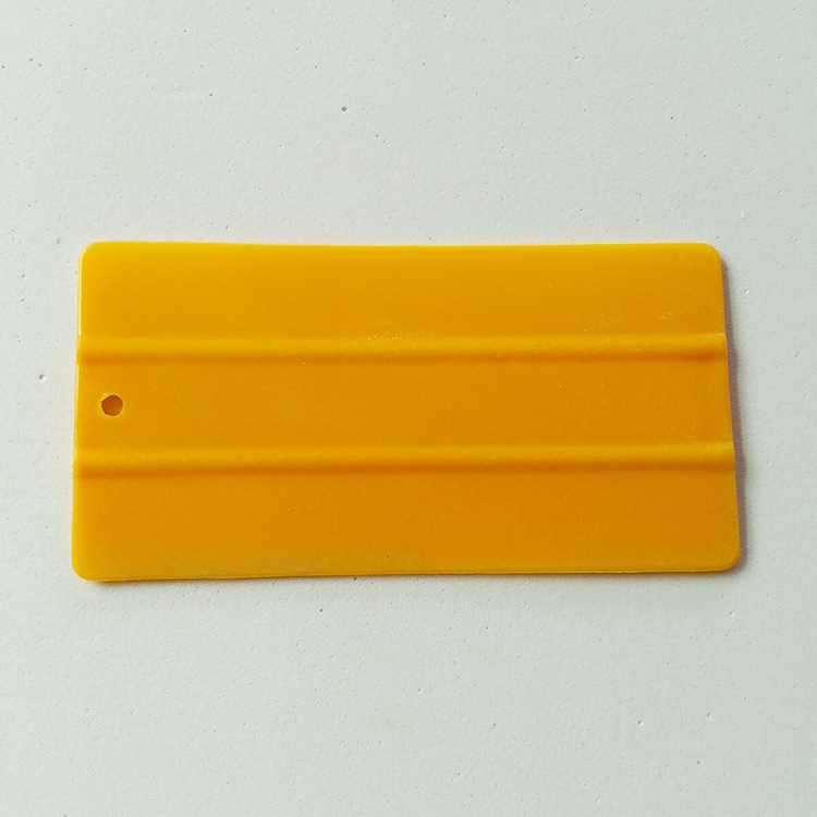 批发供应 黄色塑料家庭墙面装修小刮板 长方型加厚装潢刮板