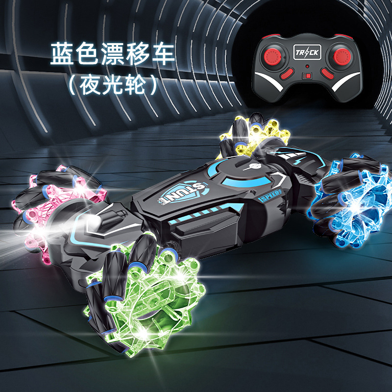 Transfronterizos acrobacias de control remoto de doble cara rueda de luz nocturna luces de deriva lateral fresca música recargable coche de juguete de cuatro tracciones