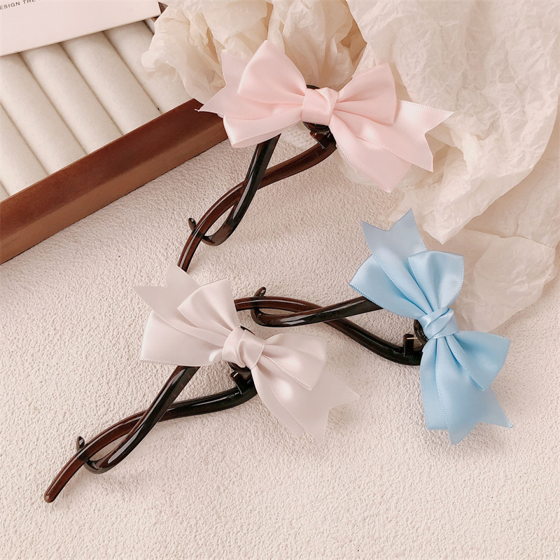 Tela retro arco banana clip para el cabello mujeres 2024 nuevo clip de agarre de alta calidad cabeza de torsión clip clip para el cabello