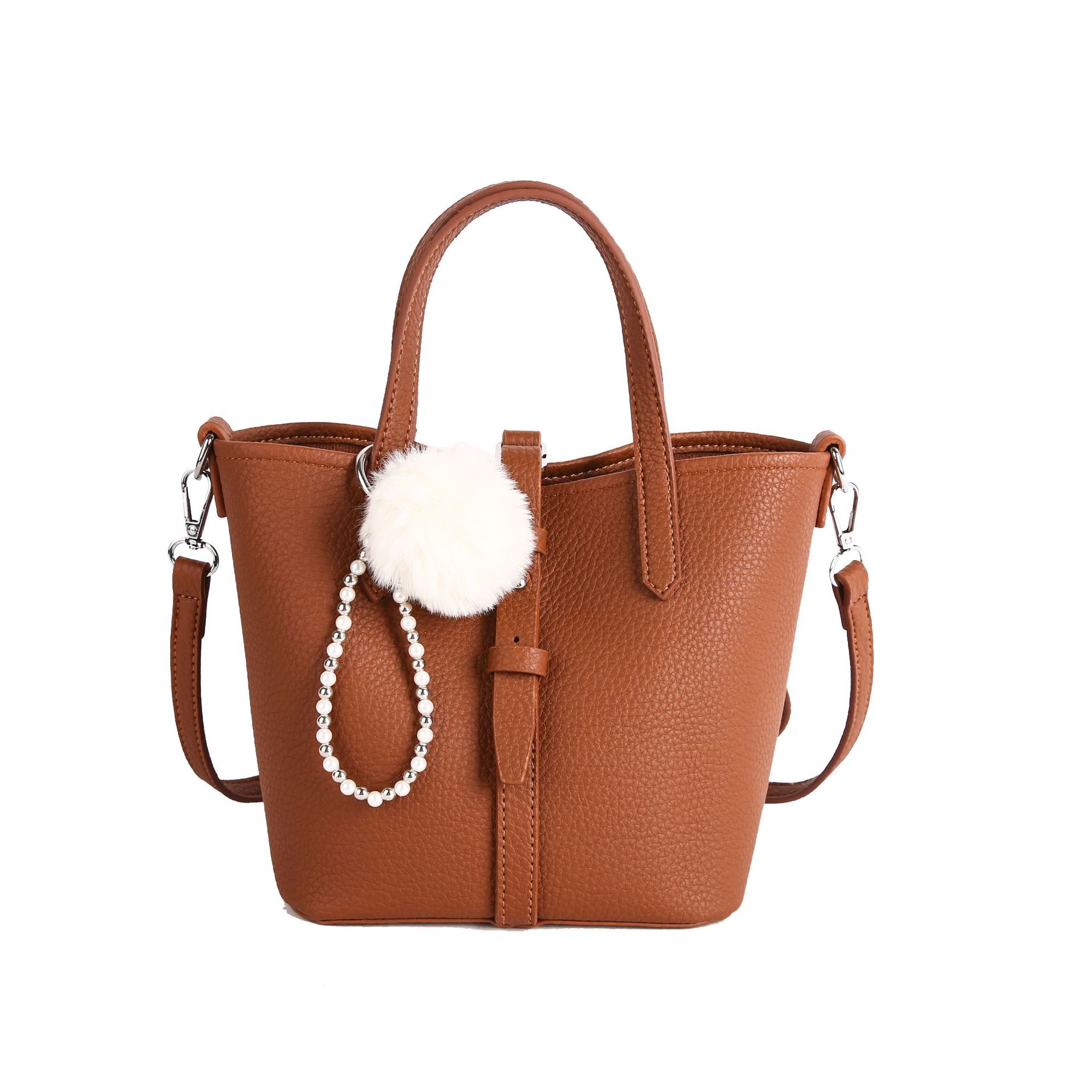 Bagos de cestas de nicho, bolsas de cubo portátiles 2025, otoño y invierno, bolsas de mujer de moda retro, bolsas de mujer.