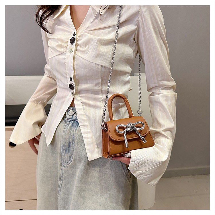 Ins niche French textured bag female 2024 new bow small square bag stylish shoulder messenger bag_voghion.com