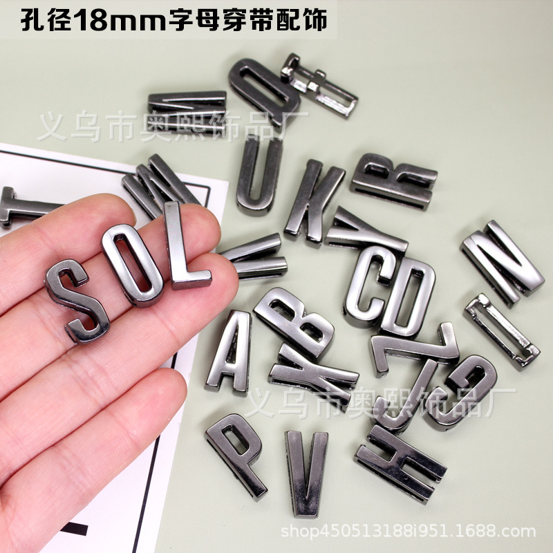 Glossy metal accessories with letters