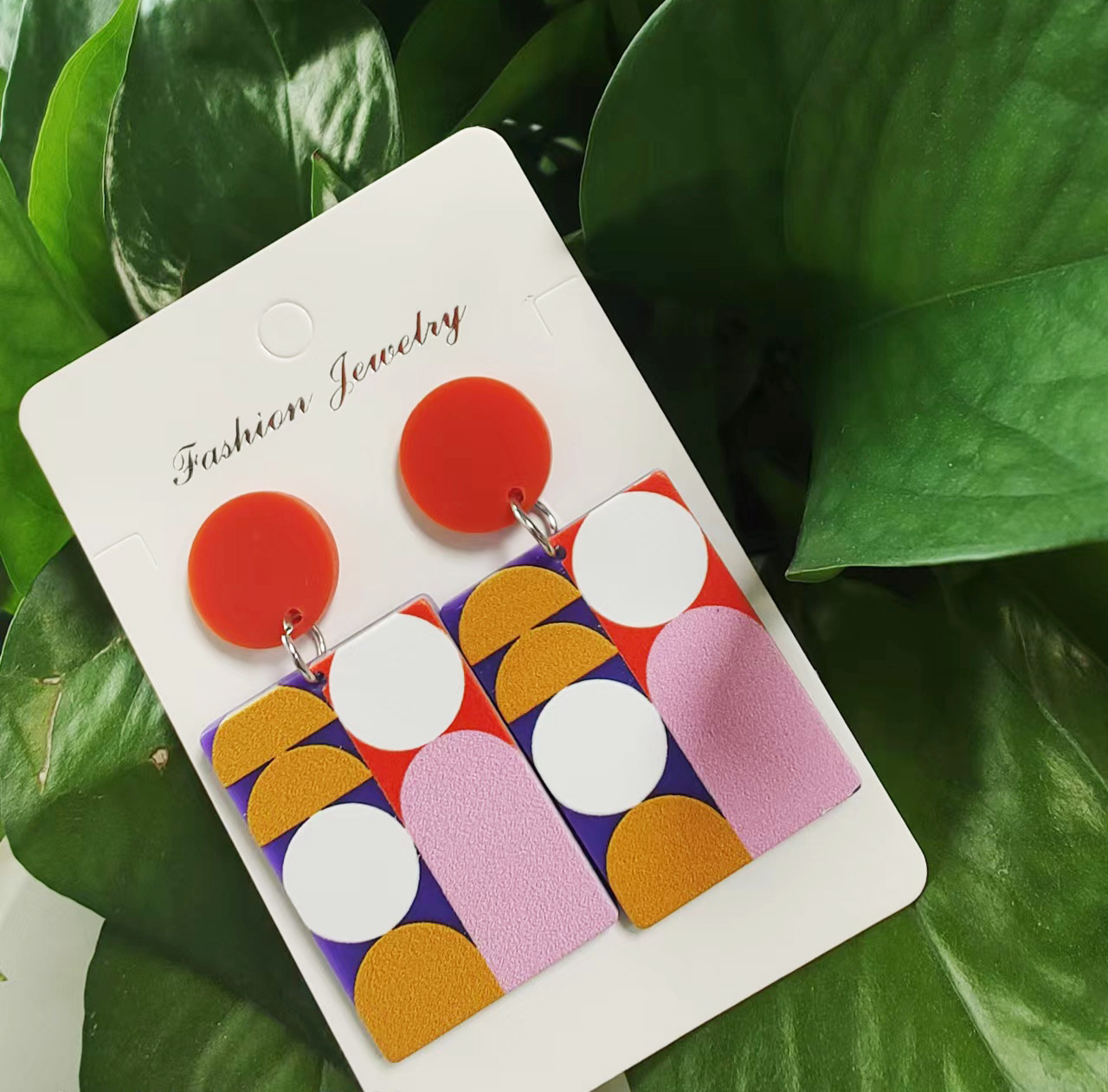 Pendientes geométricos de acrílico de acetato transfronterizo de Europa y América dulce Linda caricatura Smiley flor pintada Pendientes chapados en plata