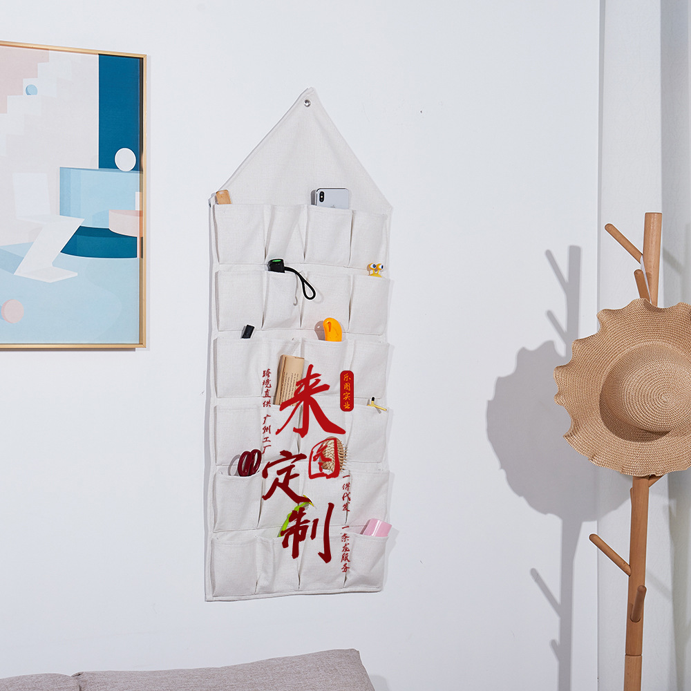La imagen se puede fijar en la pared triángulo perforado bolsa de almacenamiento de algodón y lino que organiza la sala de estar bolsa de almacenamiento de artículos diversos detrás de la puerta