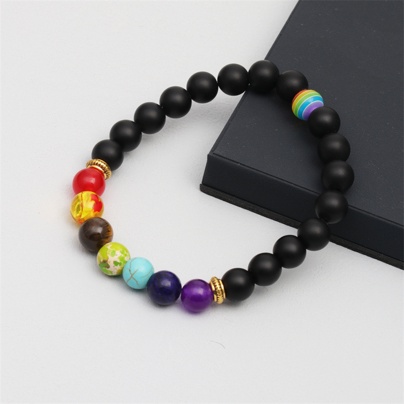 Cuentas de colores transfronterizas europeas y americanas Ojo de tigre Pulsera de cuentas de piedra volcánica pulsera de bola de color pulsera de hombres y mujeres pulsera de pareja