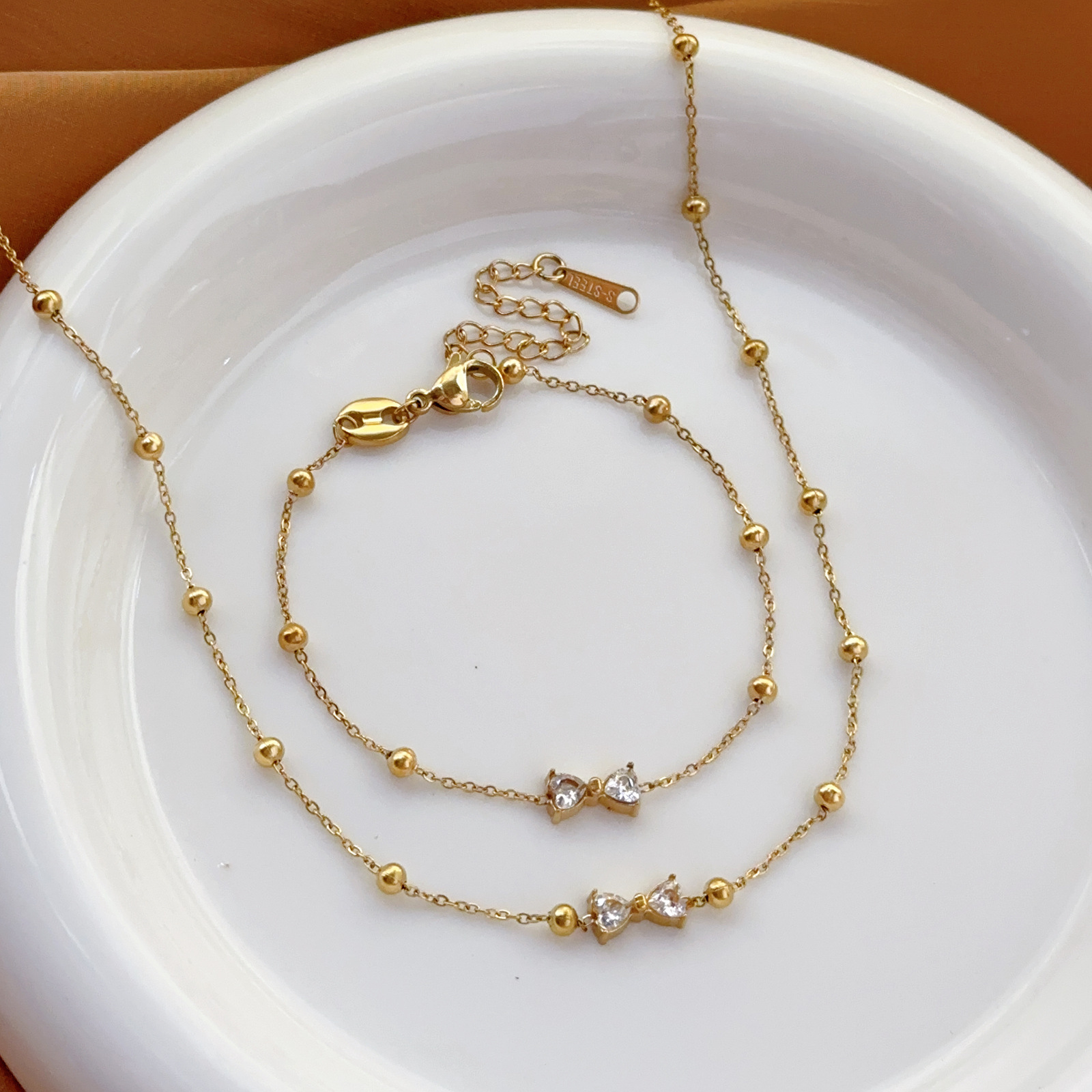 Pulsera de circón con lazo de lujo ligero francés, temperamento de moda femenina, joyería a mano simple, collar de lujo ligero, joyería que no se desvanece image 1