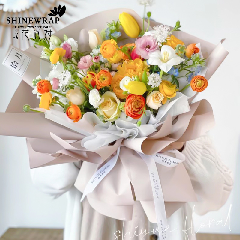 Fabricante de fiestas de flores nuevo regalo de flores papel de película de embalaje de bricolaje envoltura gruesa de papel de flores embalaje de regalo suministros de floristería