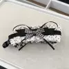 5623 black and white small fragrance banana clip-white polka dots