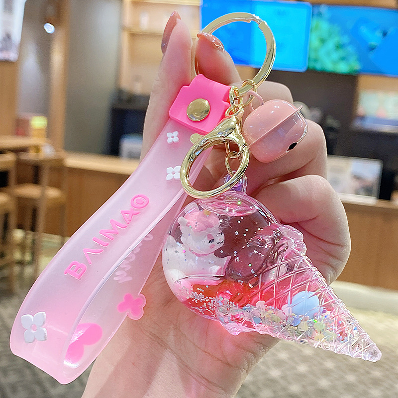Llavero de unicornio transfronterizo para mujer, exquisito y lindo colgante de botella de arena líquida de cristal con forma de helado, accesorio para mochila, pequeño adorno.