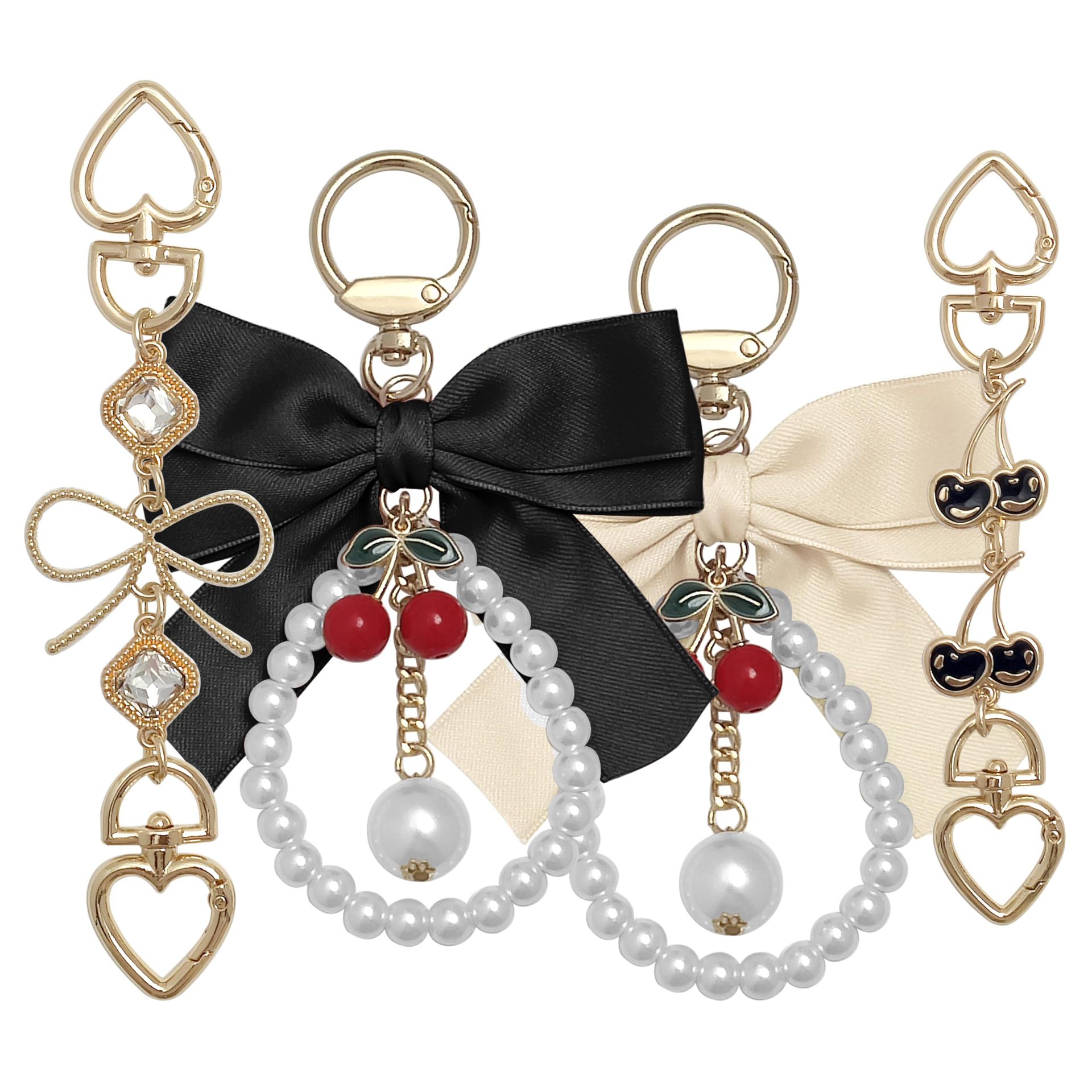 Ventas transfronterizas calientes cinta arco cadena de perlas llavero de metal colgante de flores bolsos de chicas regalos colgantes