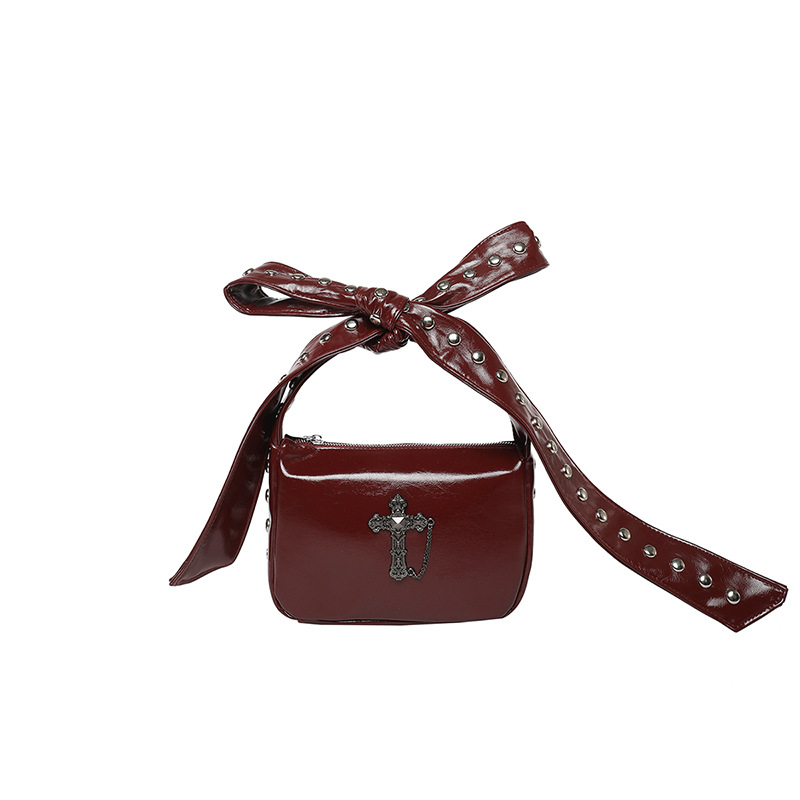 Bolso de textura transfronteriza 2025 verano nuevo bolso femenino moda fresco remache bandolera cruz personalizada