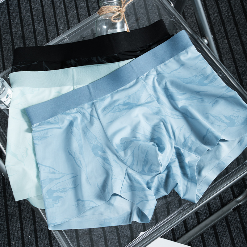 2025 verano hombre nylon hielo antibacteriano respirable calzoncillos de ángulo plano de moda hombre cuatro pantalones delgados de hielo rápido secado