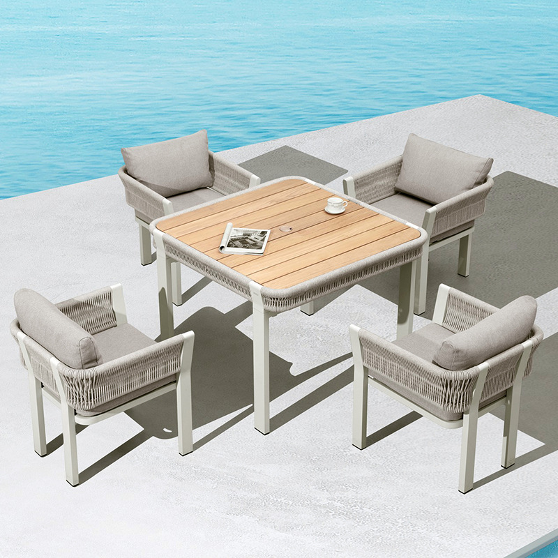 Mesa y silla de ocio al aire libre patio villa jardín combinación de tela de caña hotel residencial terraza al aire libre silla de caña impermeable image 11
