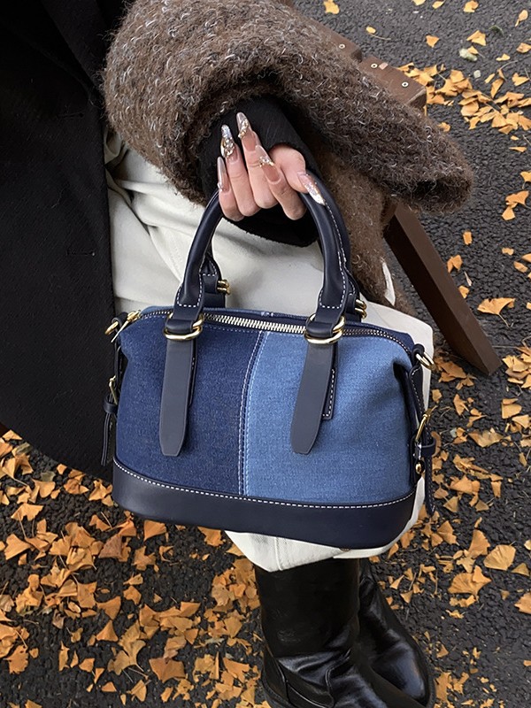 Alto nuevo bolso de almohada portátil para mujeres 2024 nuevo cross-border jeans color de empalme de hombro mochila