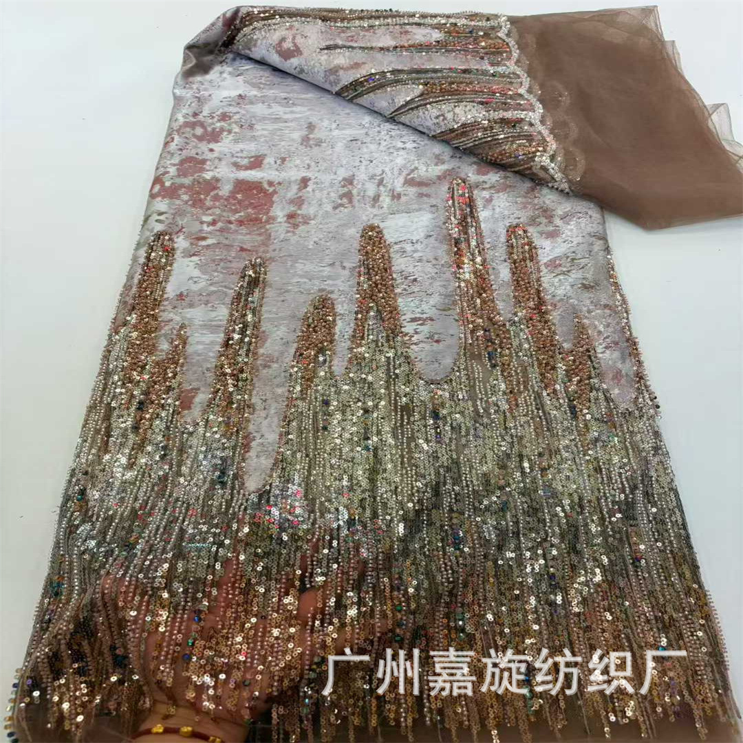 Nuevo gradiente de cuentas bordadas empalmadas tinta fuerte Jacquard tela de encaje vestido de boda europea y americana tela de vestido