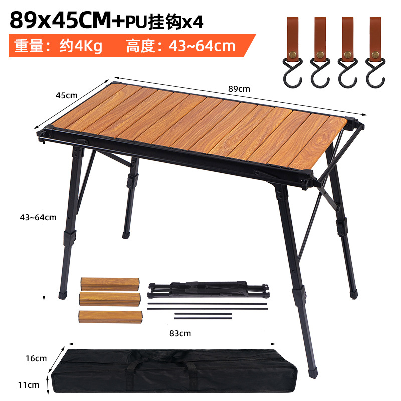Mesa plegable al aire libre grano de madera aleación de aluminio mesa de rollo de huevo gran elevación camping mesa de comedor portátil camping auto-conducción mesa de aluminio
