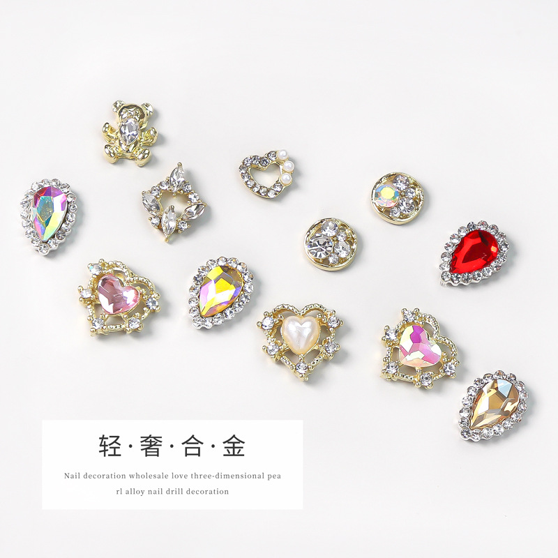 Nueva joyería de uñas LZ diamante completo con incrustaciones de diamantes de color perla oso color mágico uñas de metal joyas de aleación de diamantes decorativos