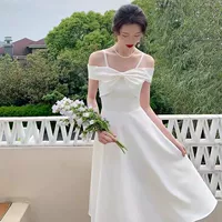 Элегантное белое свадебное платье с бантом - идеальное решение для подружек невесты, вечерних мероприятий и особых случаев.