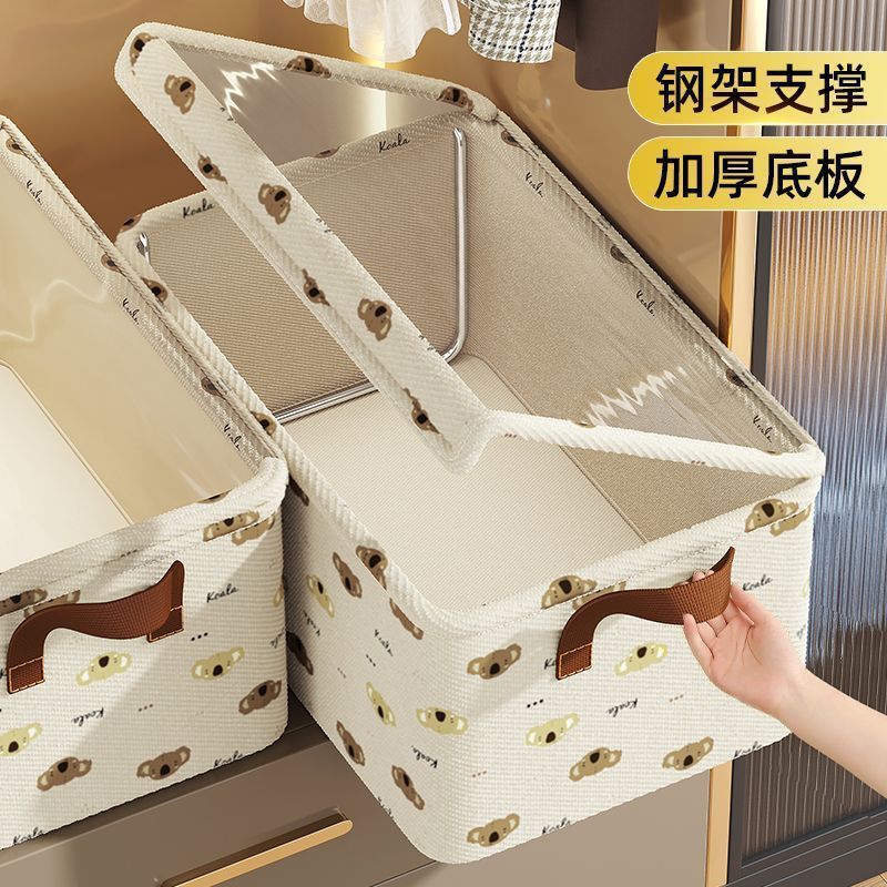 服の下着の収納ボックスには蓋があります。折りたたみ可能なタンスには収納ボックスを内蔵しています。|undefined