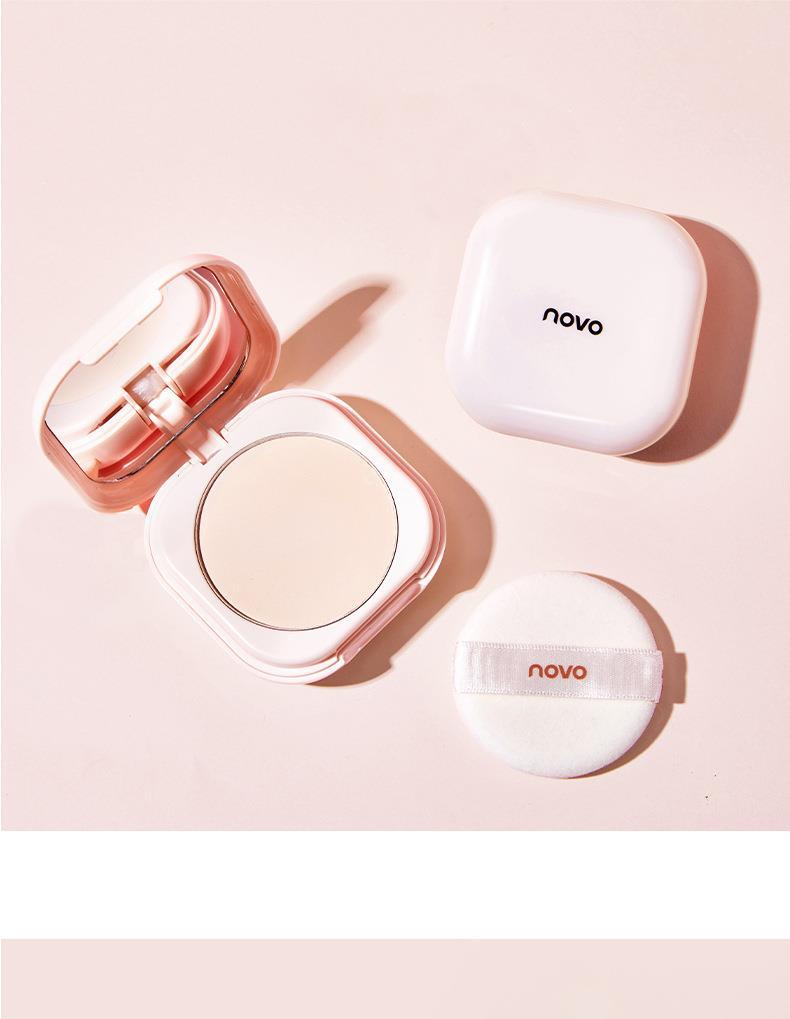 NOVO Satin Luxury Setting Powder Compact controls oil, sets makeup and brightens skin tone. Compact and portable touch-up Powder compact undefined