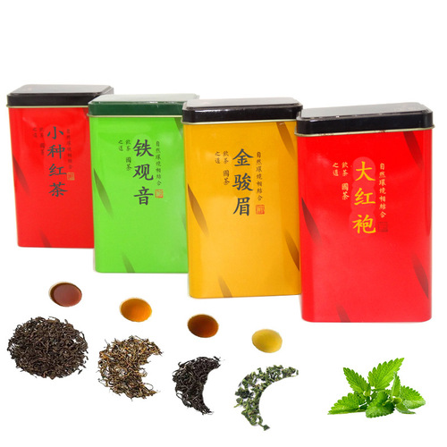 Tea in iron canisters: Tie Guan Yin, Da Hong Pao, Jin Jun Mei, Jasmine Tea, Biluochun, Maojian, Oolong Tea