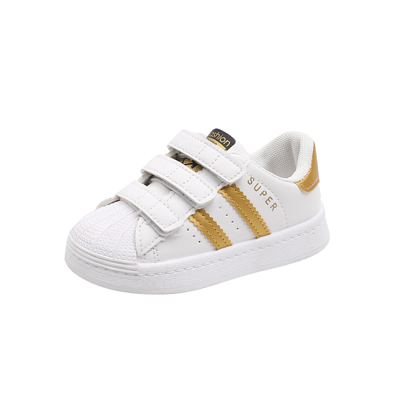 Zapatos para niños al por mayor primavera y otoño niños y niñas Baby Shell Head Sneaker zapatos blancos casuales para niños zapatos de tablero de fondo suave para niños moda