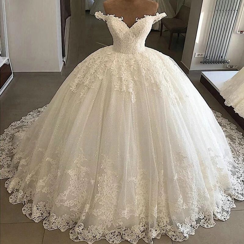 Vestido de novia principal cola grande europeo y americano transfronterizo blanco largo cuello en V francés adelgazamiento retro encaje vestido de novia fábrica al por mayor