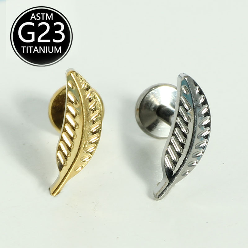 Silver pointed spike labret stud material detail