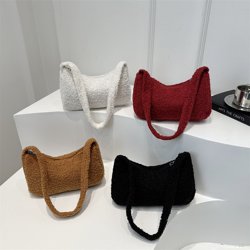 2025 primavera nueva granular cordero hombro brazo bolso de estilo coreano minimalista bolso de mujer bolso de peluche lindo mochila