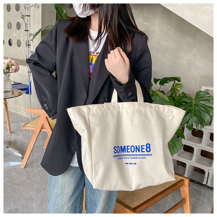 A large-capacity, sturdy Japanese-style canvas bag for women, a new 2022 simple bento handbag for girls to go to work undefined