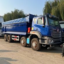 现货跨境非洲豪沃NX自卸车8x4U型大箱翻斗货车矿山砂石料运输卡车