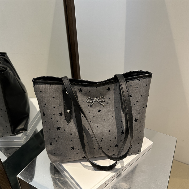 Bolsa de tela de gran capacidad de aire extranjero, punto de onda de corazón de桃ar, otoño de 2024 nueva moda de moda, bolsa de hombro universal