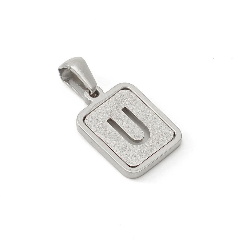 Nueva moda de acero inoxidable letra inglesa colgante de fábrica al por mayor carta prensada en arena titanio acero 18K Commuter todo partido